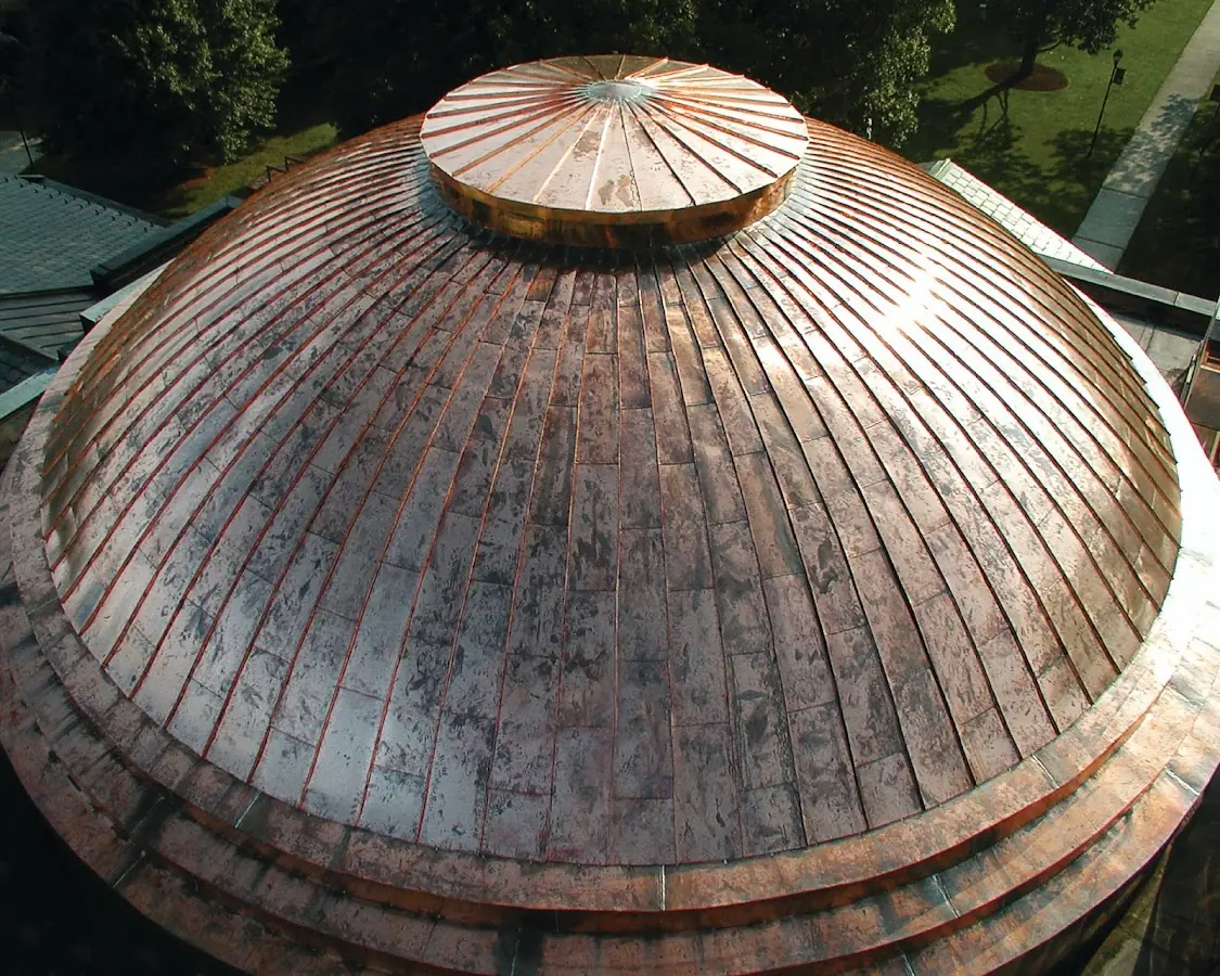 Craftsman Roofing crew installing a new roof in Sterling